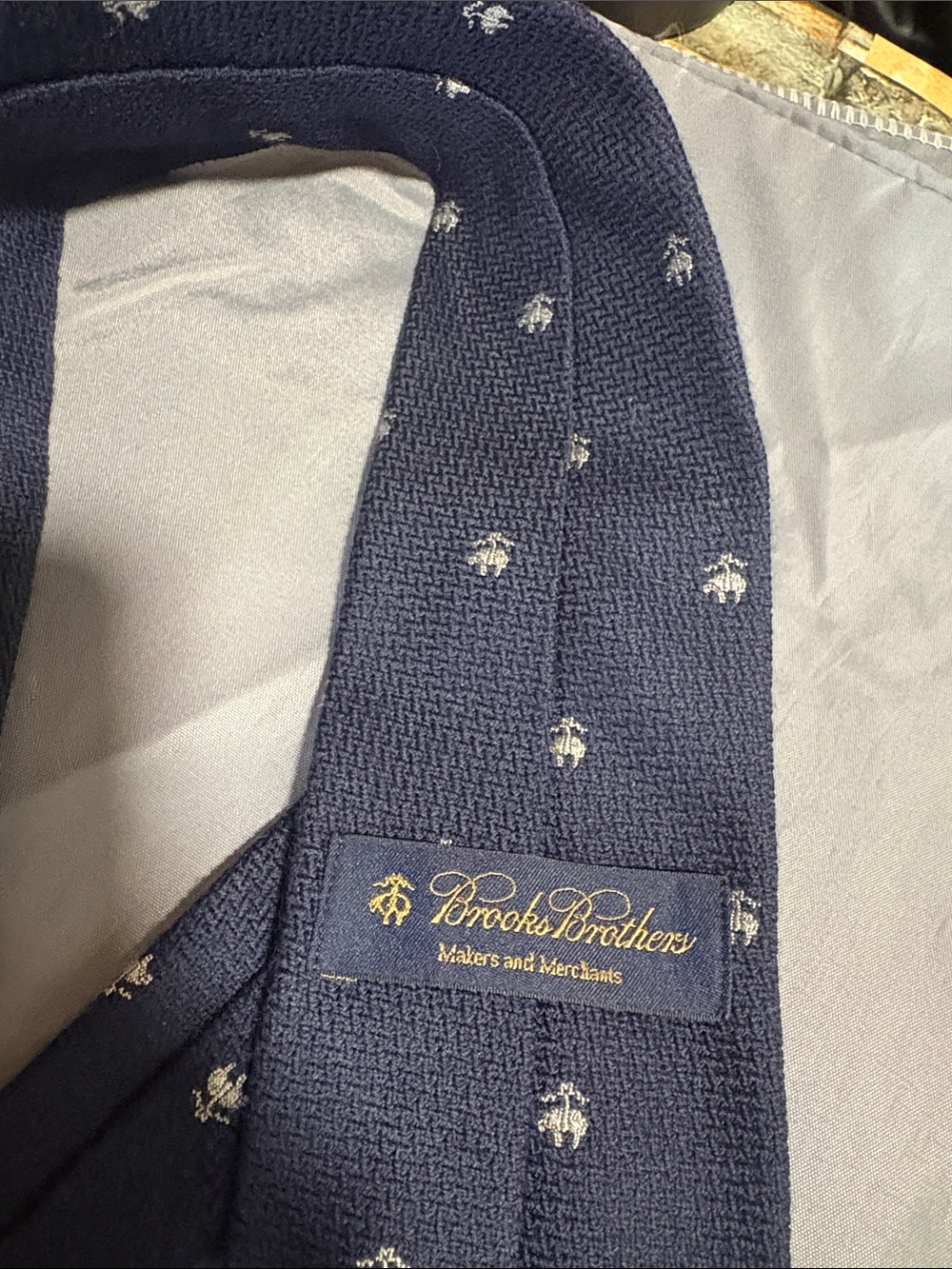 Brooks Brothers Navy Tie with Light Gray Emblem Motifs